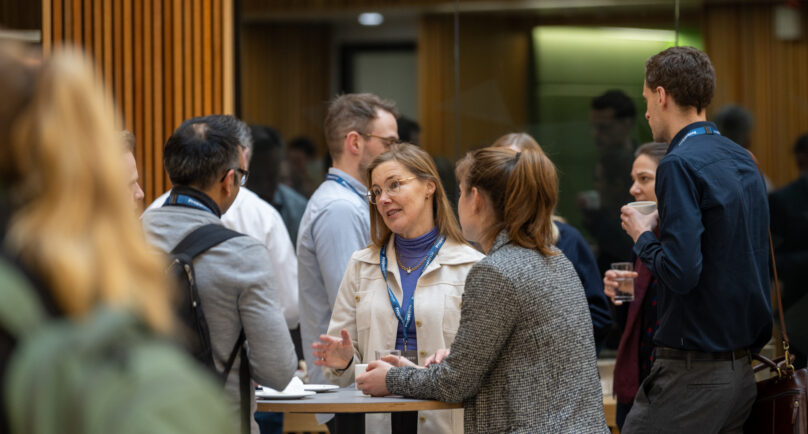 Propel cohort members at a networking event.